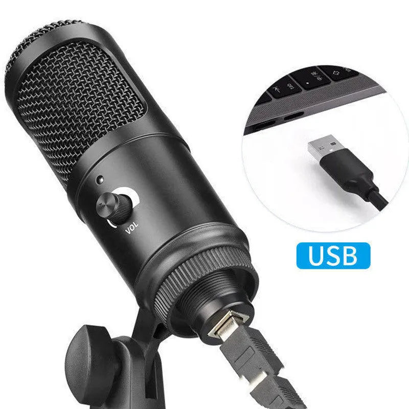 Black desktop condenser microphone with adjustable stand on computer desk