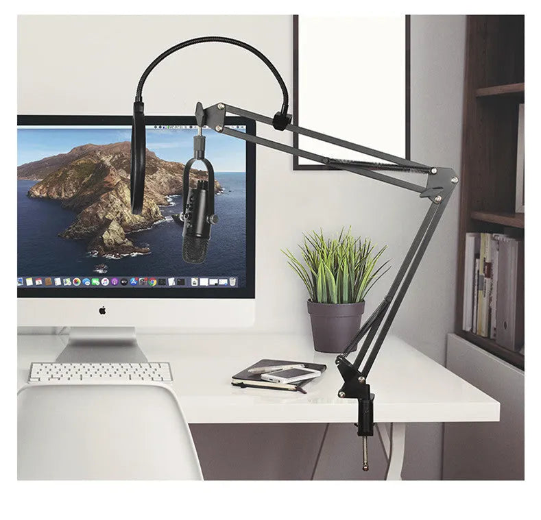 Black JIY BM-86PRO USB condenser microphone on a metal stand with foam windscreen.