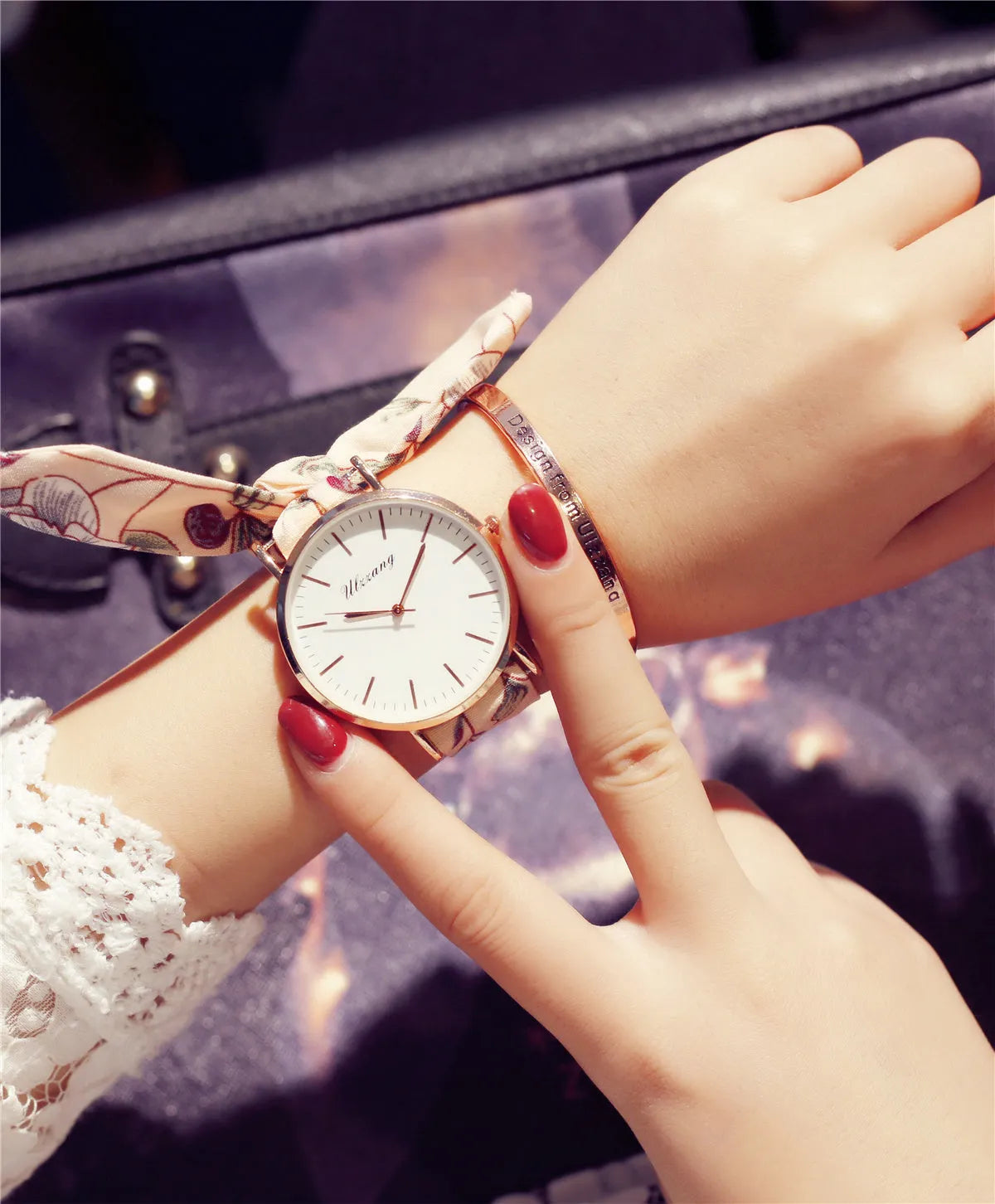 Retro art women tie watch with round alloy case and cloth strap in pink