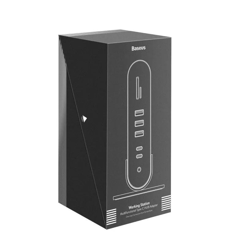 Deep space grey 16-in-1 Type-C docking station hub with multiple ports and external power supply on a desk.