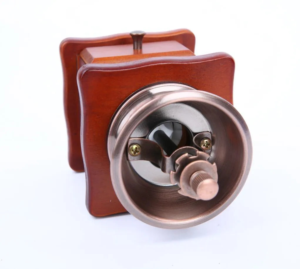 Manual hand coffee grinder in red with ceramic burrs compact 10x10x17cm size
