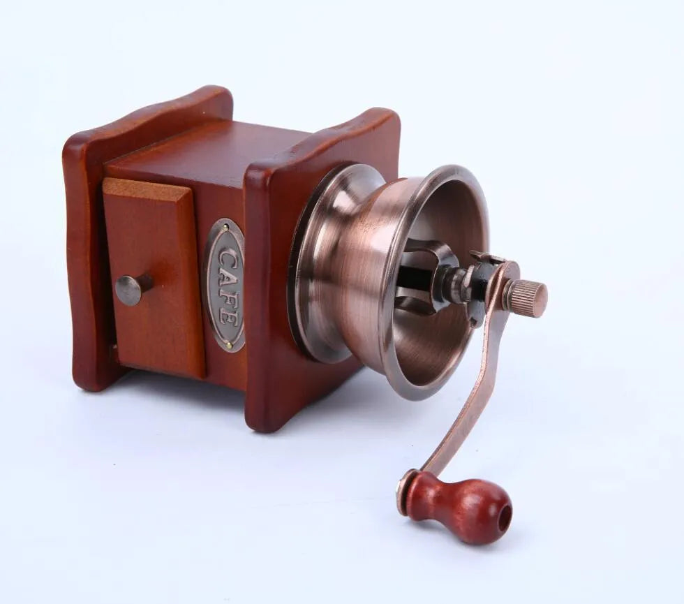 Manual hand coffee grinder in red with ceramic burrs compact 10x10x17cm size
