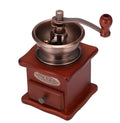 Manual hand coffee grinder in red with ceramic burrs compact 10x10x17cm size