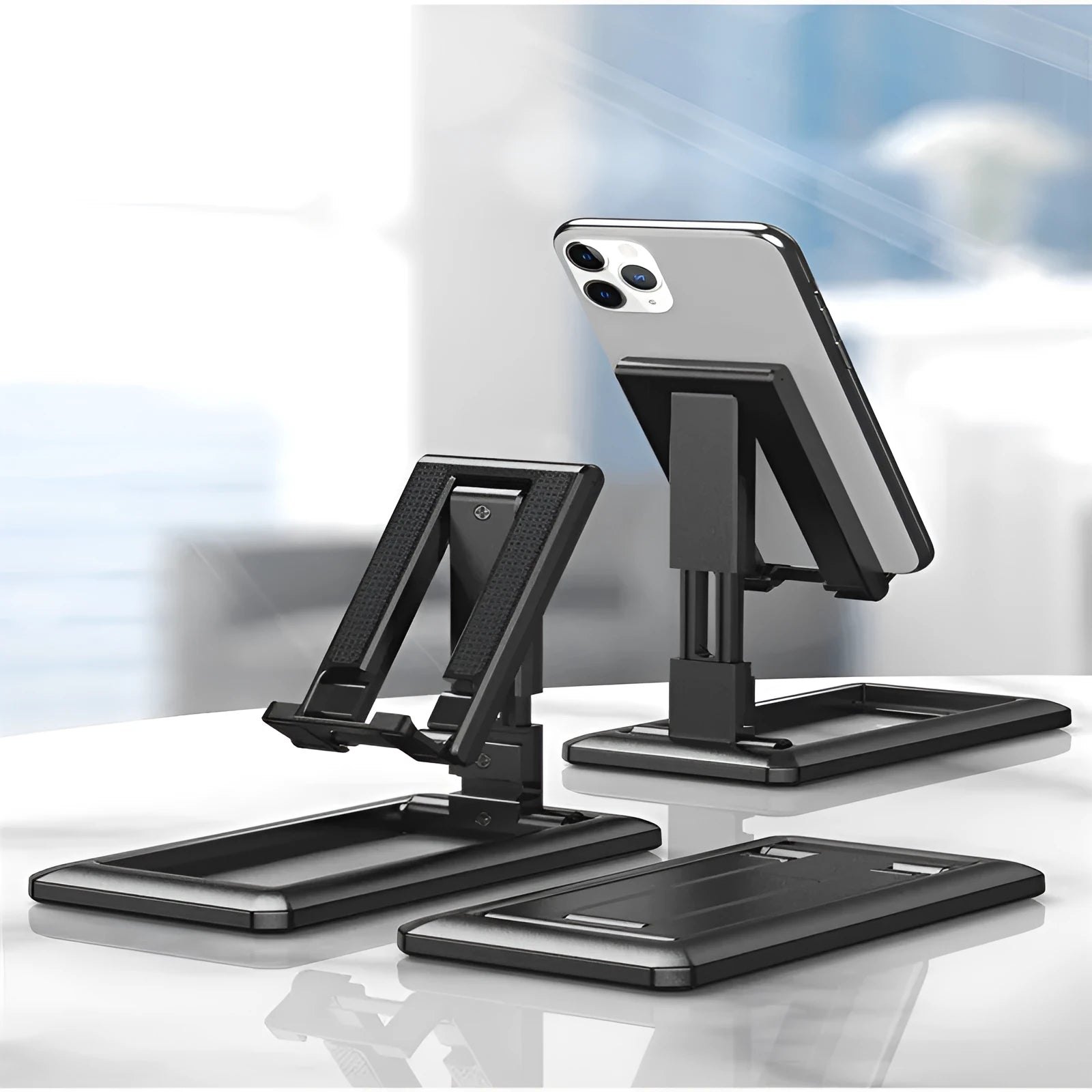 Retractable lazy bracket mobile phone stand in collapsed and extended positions