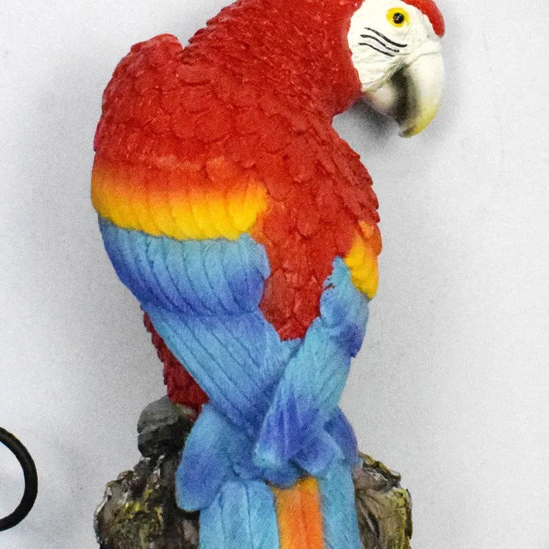 Hand-painted resin parrot solar light for garden lawn decoration, available in blue red yellow colours