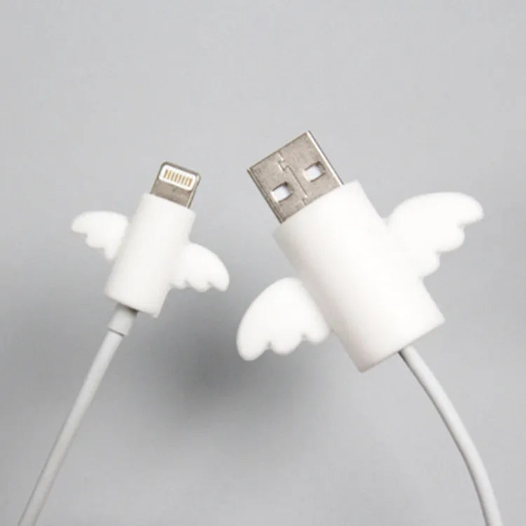 White and black silicone cable protective covers shown next to mobile phone charging cable