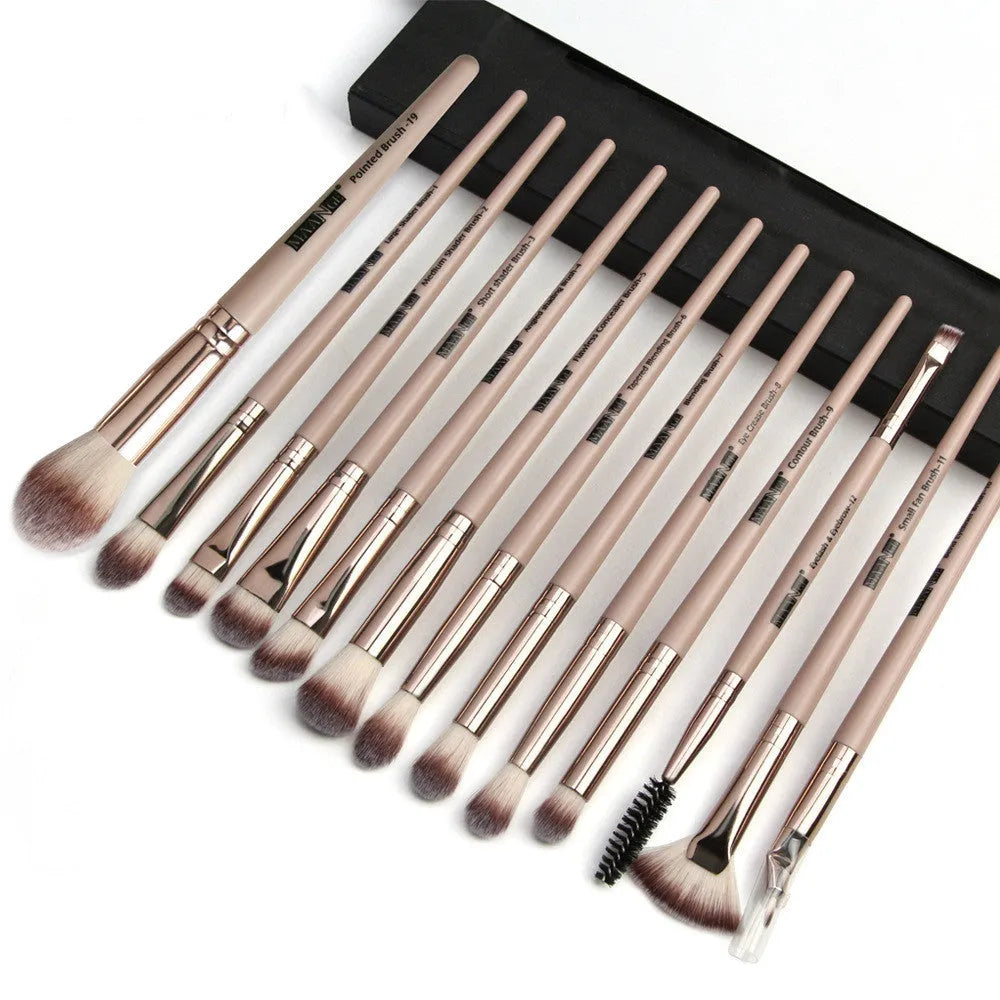 13 piece eye makeup brush set with nylon bristles and plastic handles in pink rose gold finish