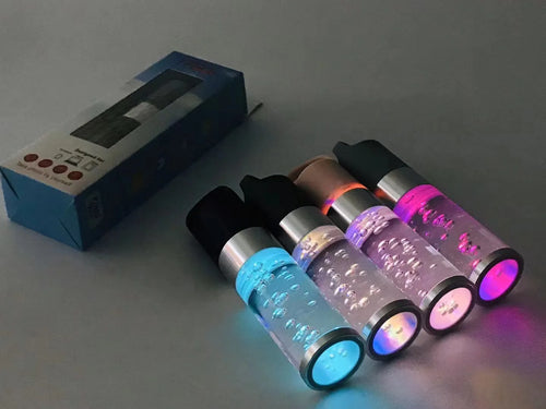 Pink Bluetooth speaker with colourful crystal LED lights showing compact 145mm design