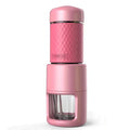 Portable manual espresso coffee machine in four colours with compact stainless steel design.