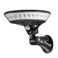 White solar-powered outdoor light with 360-degree LEDs and a top-mounted solar panel on a stake.