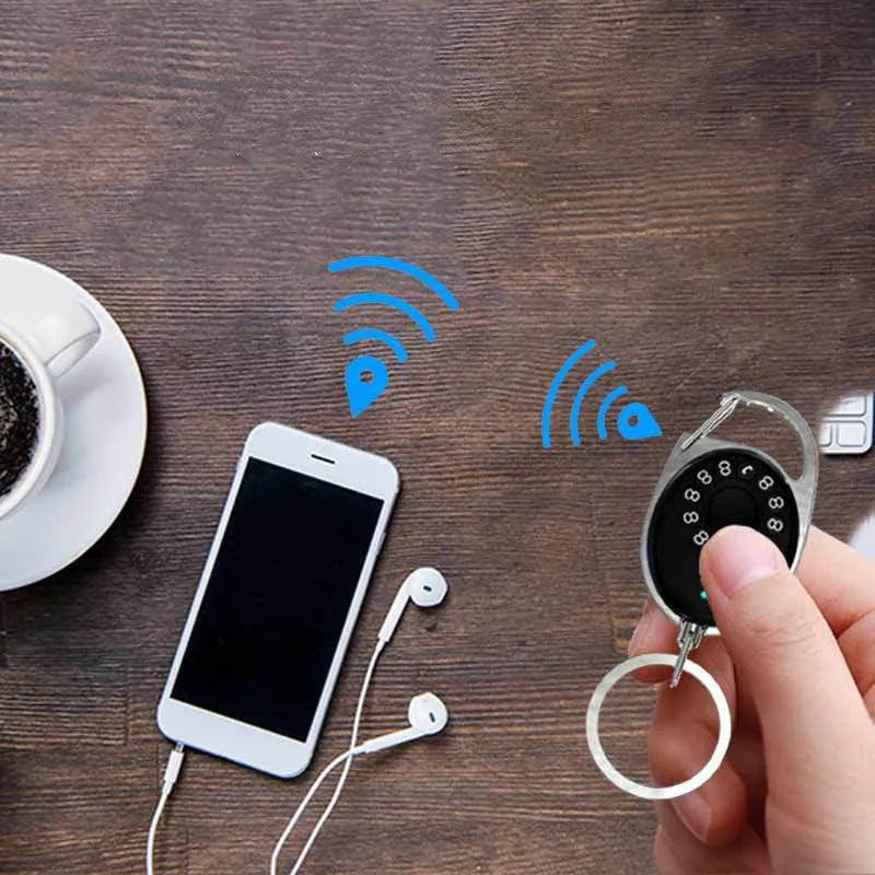 Black Bluetooth anti-lost tracker with metal keychain compatible with Apple iPhone for selfie remote