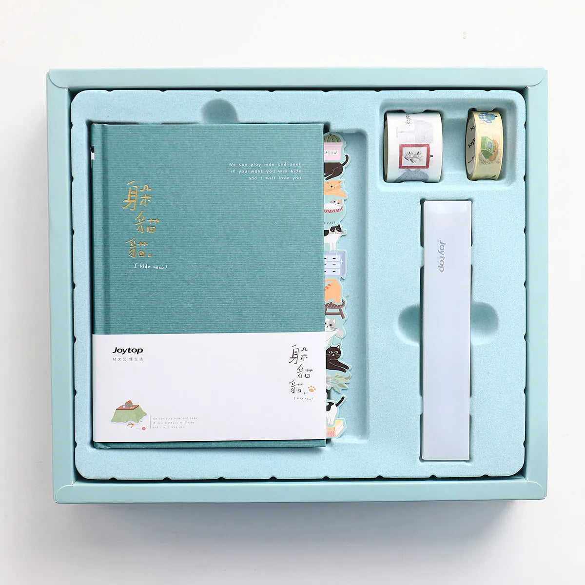 Peekaboo gift box containing an A5 wire-o bound notebook and a pen