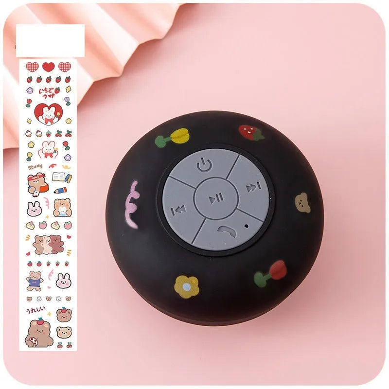 Waterproof Bluetooth mini speaker with suction cup attachment in multiple colour options