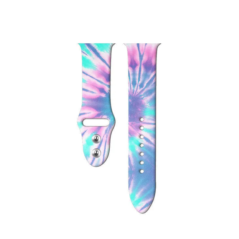 Silicone Apple Watch band in a colourful tie-dye pattern, showing the adjustable strap length.