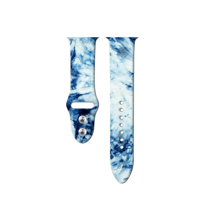 Silicone Apple Watch band in a colourful tie-dye pattern, showing the adjustable strap length.
