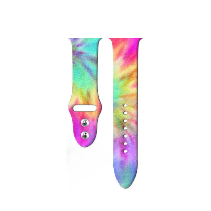 Silicone Apple Watch band in a colourful tie-dye pattern, showing the adjustable strap length.