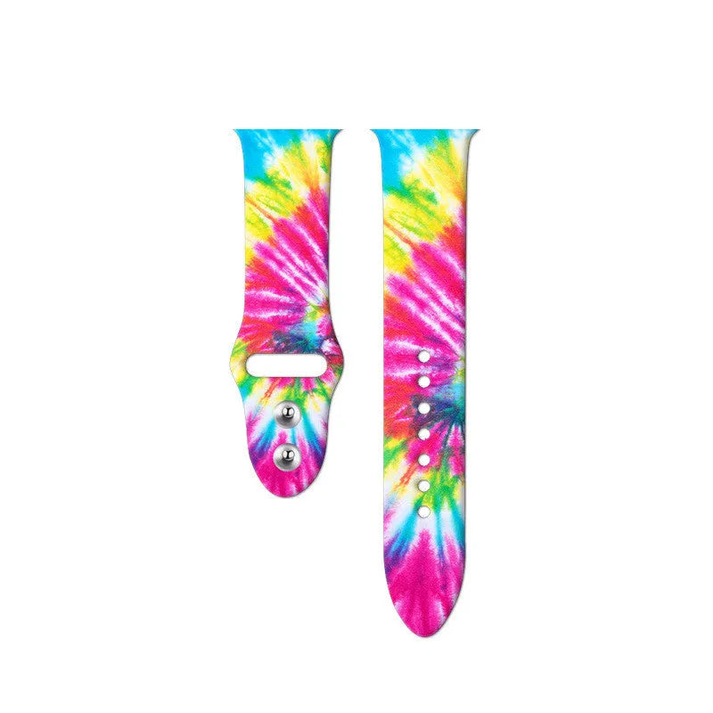 Silicone Apple Watch band in a colourful tie-dye pattern, showing the adjustable strap length.
