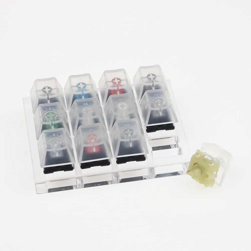White mechanical keyboard with twelve different Cherry MX switch types for testing