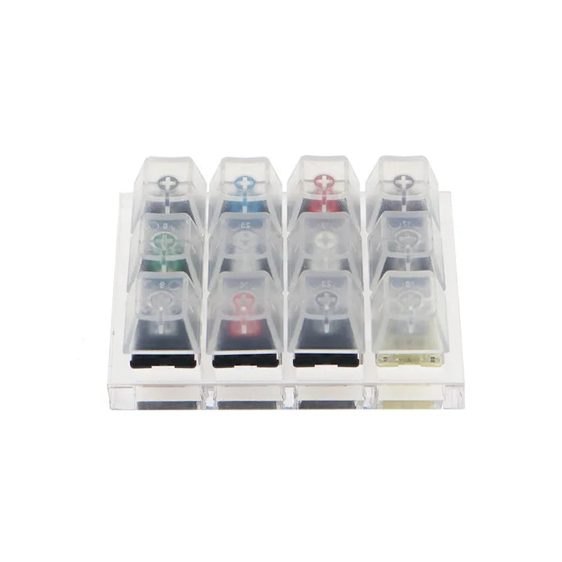 White mechanical keyboard with twelve different Cherry MX switch types for testing