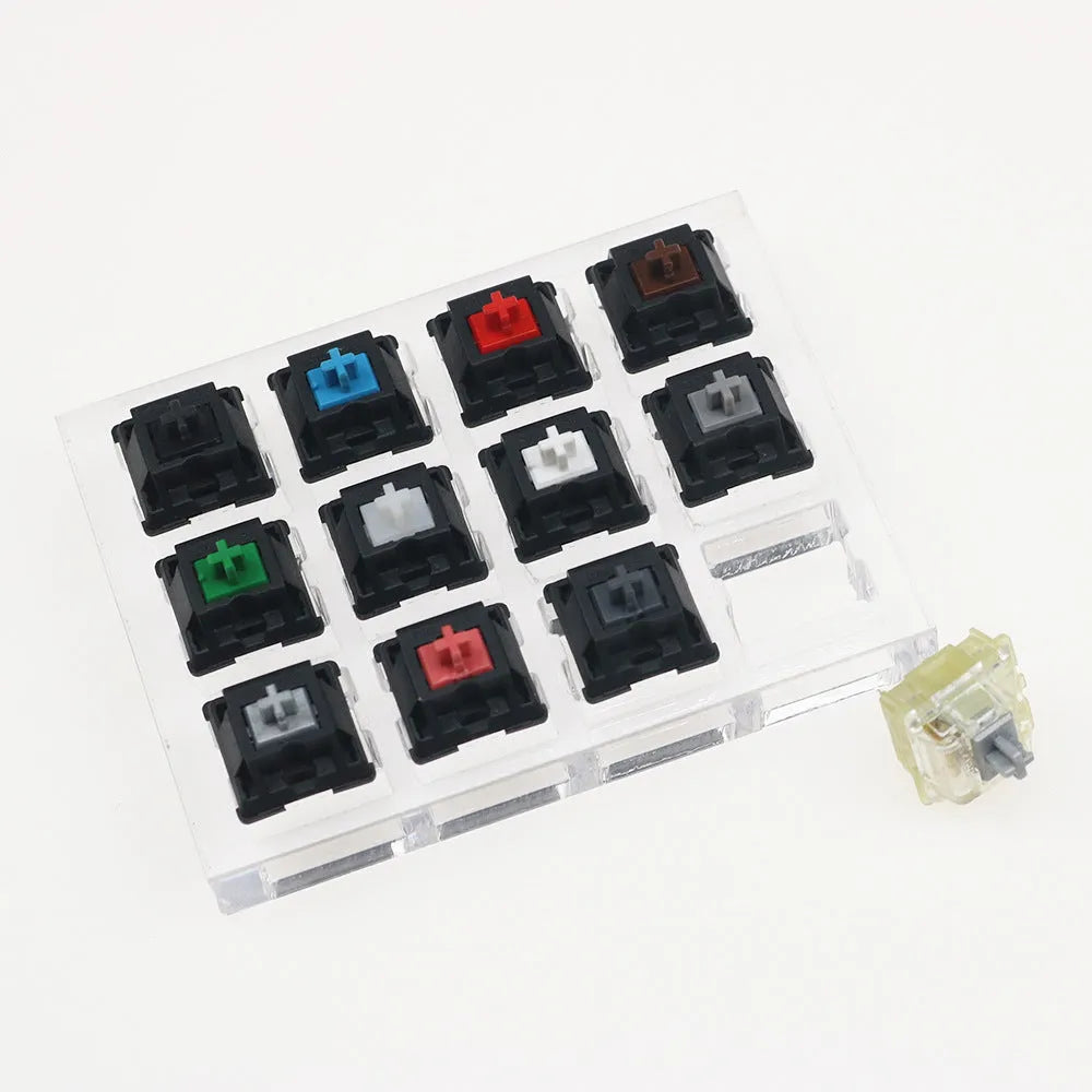 White mechanical keyboard with twelve different Cherry MX switch types for testing