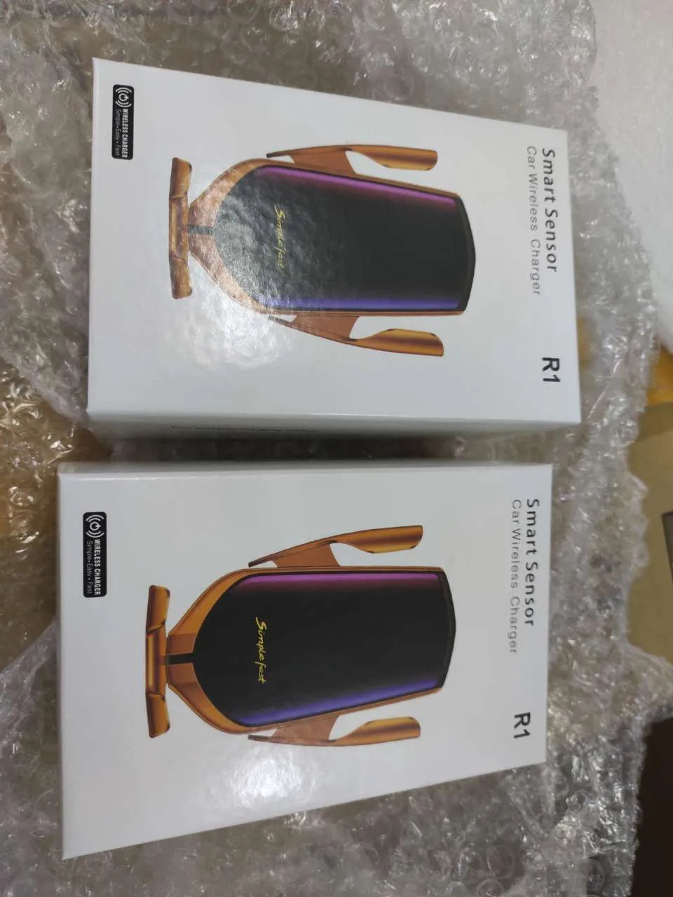 Magic Clip R1 automatic car wireless phone charger in gold and silver colours showing mounting and charging features