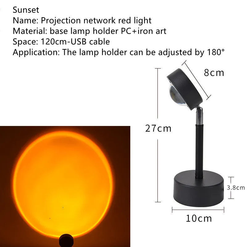WiFi LED sunset projector light with 16 RGB colours, 360° rotation, glass lampshade, and touch switch on a table