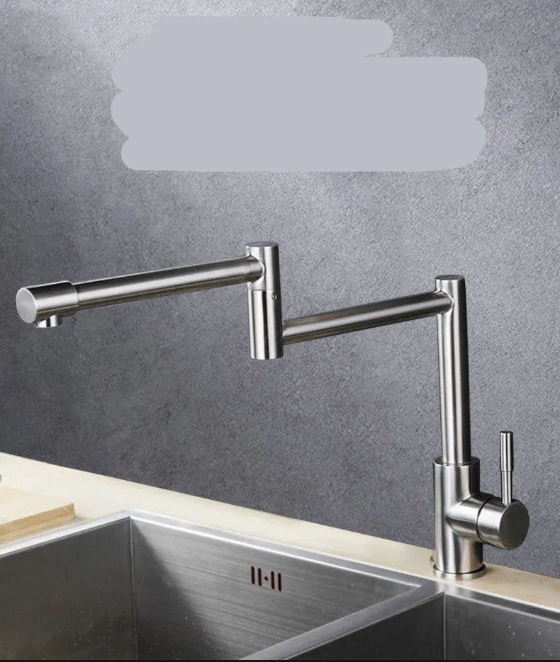 Silver stainless steel dual-control kitchen tap showing 360-degree rotation capability