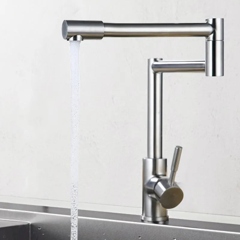 Silver stainless steel dual-control kitchen tap showing 360-degree rotation capability