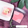 Pink self-adhesive plastic packaging bag with UV printing measuring 7x7cm plus 3cm adhesive flap