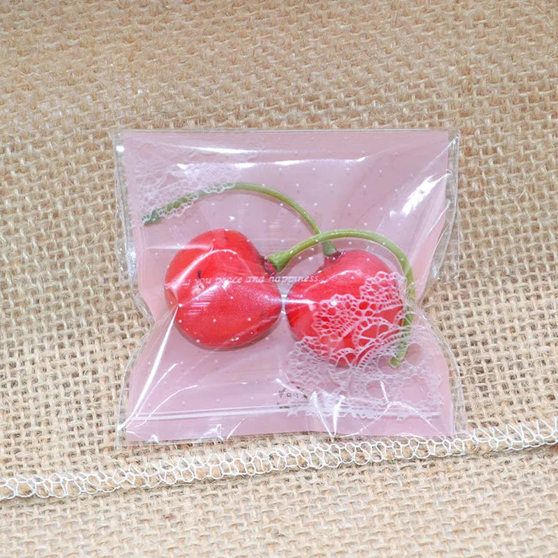 Pink self-adhesive plastic packaging bag with UV printing measuring 7x7cm plus 3cm adhesive flap