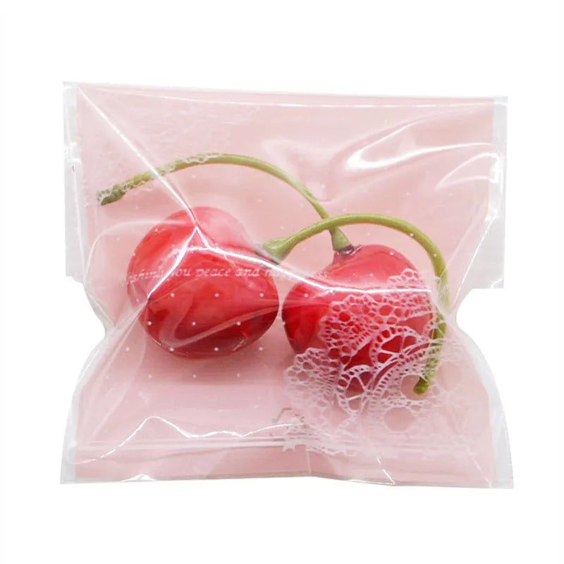 Pink self-adhesive plastic packaging bag with UV printing measuring 7x7cm plus 3cm adhesive flap