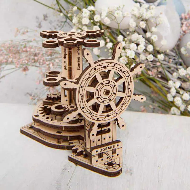 Ukrainian wooden rotating pen holder model with steering wheel mechanism on wooden base