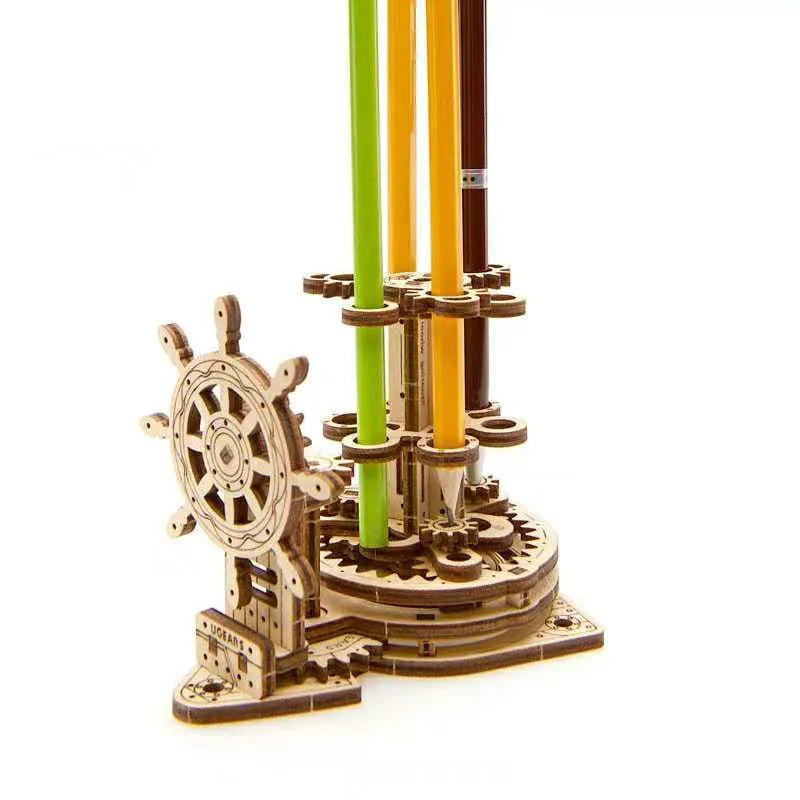 Ukrainian wooden rotating pen holder model with steering wheel mechanism on wooden base