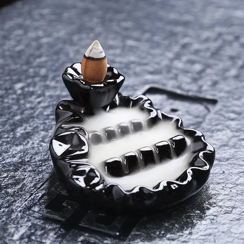 Ceramic backflow incense burner with black glaze finish and waterfall smoke effect