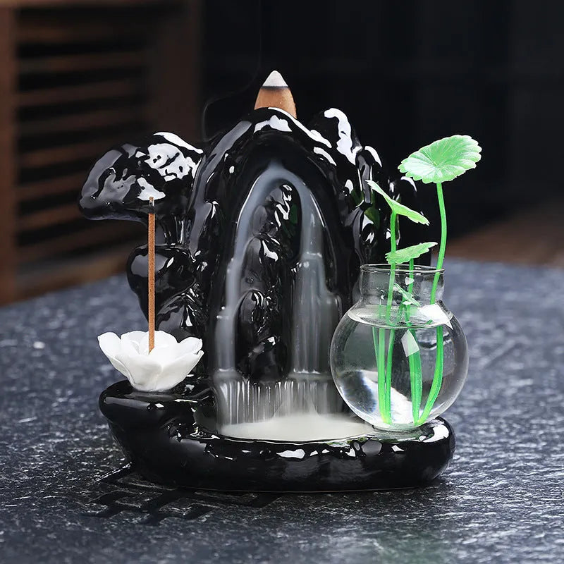 Ceramic backflow incense burner with black glaze finish and waterfall smoke effect