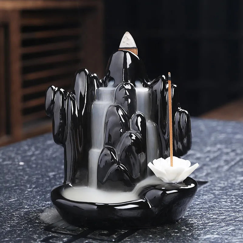 Ceramic backflow incense burner with black glaze finish and waterfall smoke effect