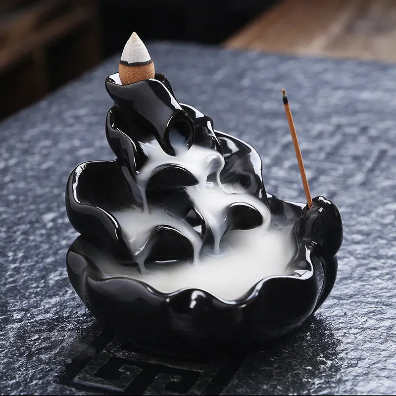 Ceramic backflow incense burner with black glaze finish and waterfall smoke effect