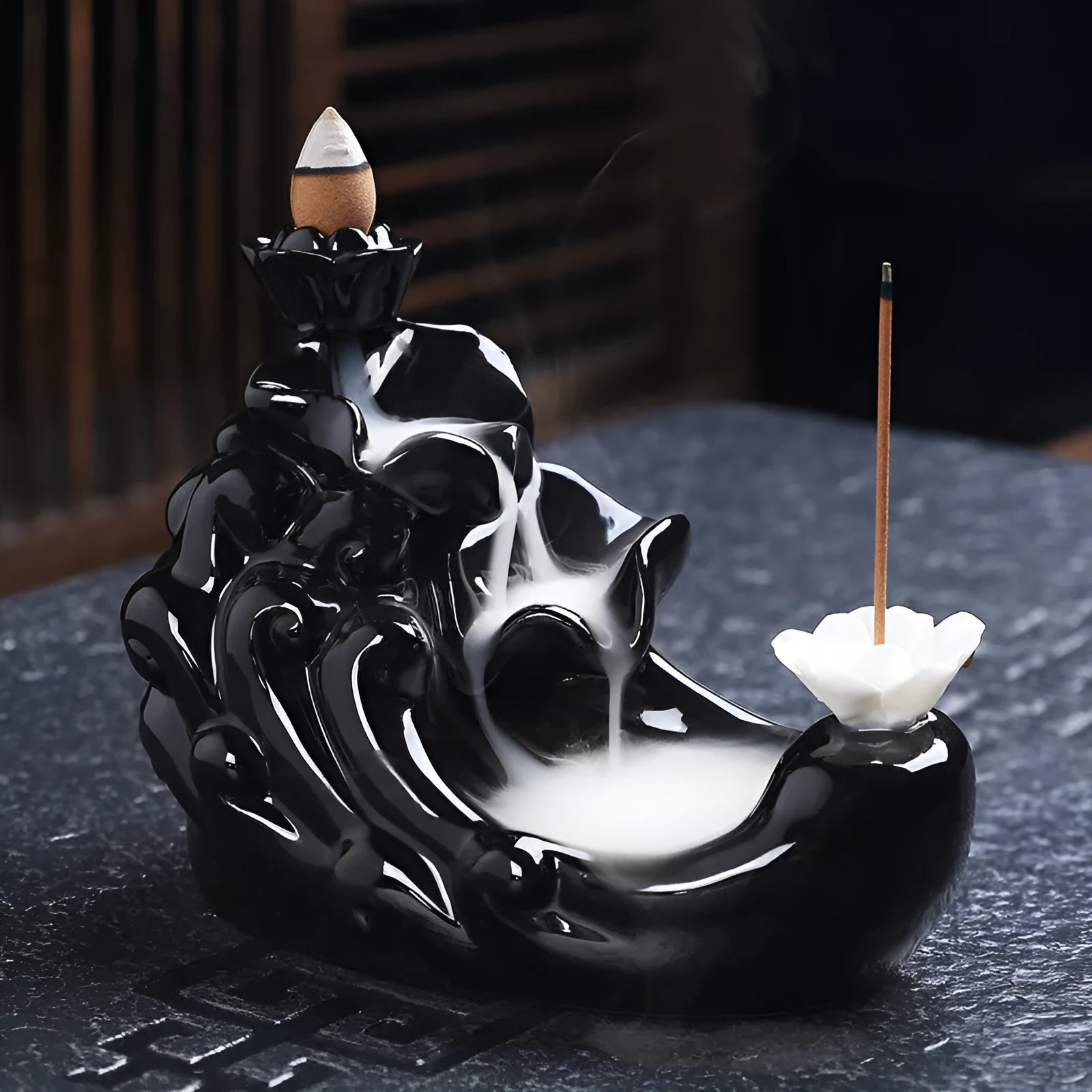 Ceramic backflow incense burner with black glaze finish and waterfall smoke effect
