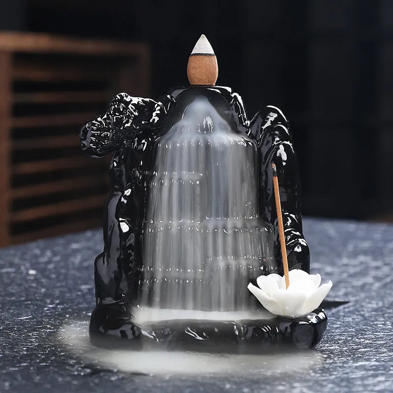 Ceramic backflow incense burner with black glaze finish and waterfall smoke effect