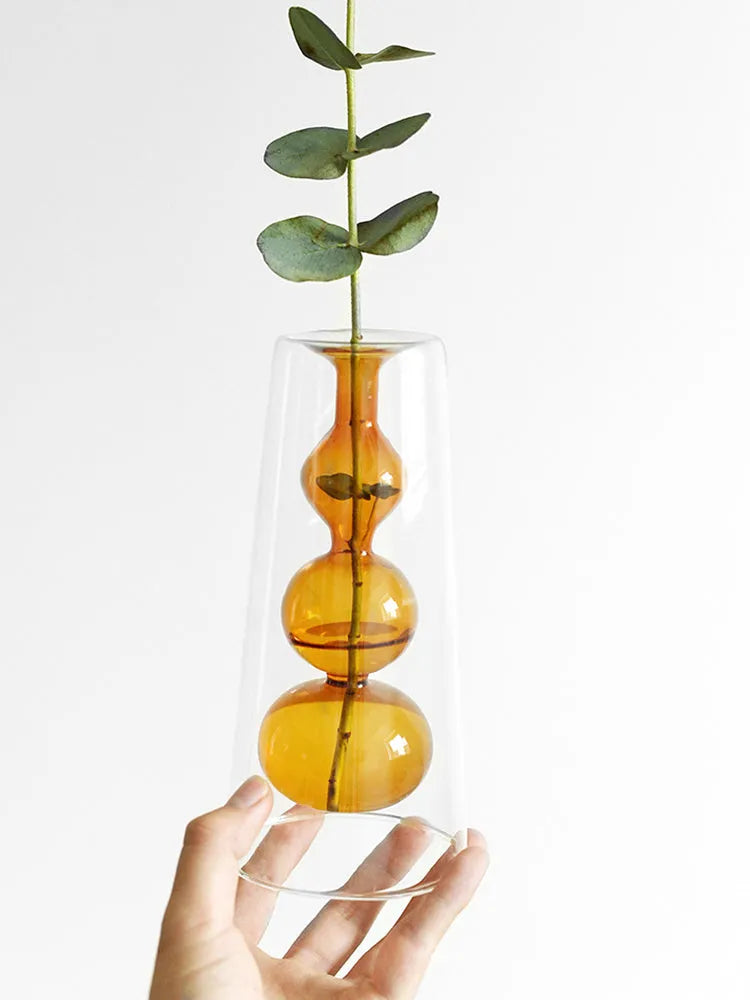 ReFound retro stained glass gourd vase in green for hydroponic flowers on a countertop