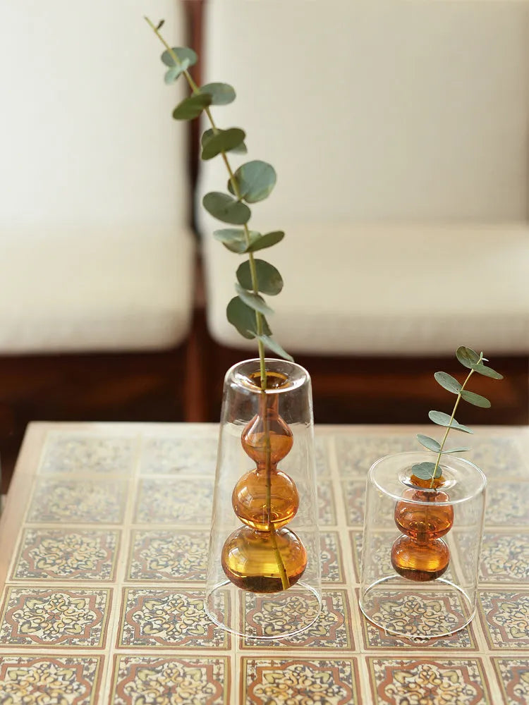ReFound retro stained glass gourd vase in green for hydroponic flowers on a countertop