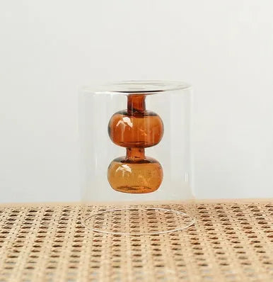 ReFound retro stained glass gourd vase in green for hydroponic flowers on a countertop