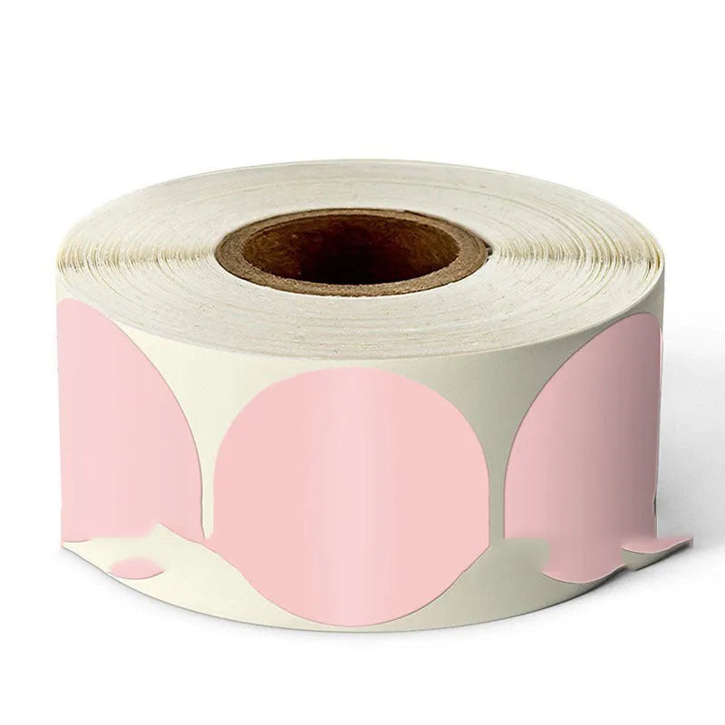 Roll of round colour marker stickers showing multiple colours including black, blue, red, yellow, and kraft paper.