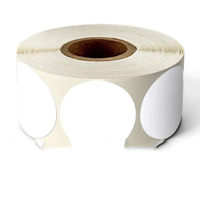 Roll of round colour marker stickers showing multiple colours including black, blue, red, yellow, and kraft paper.