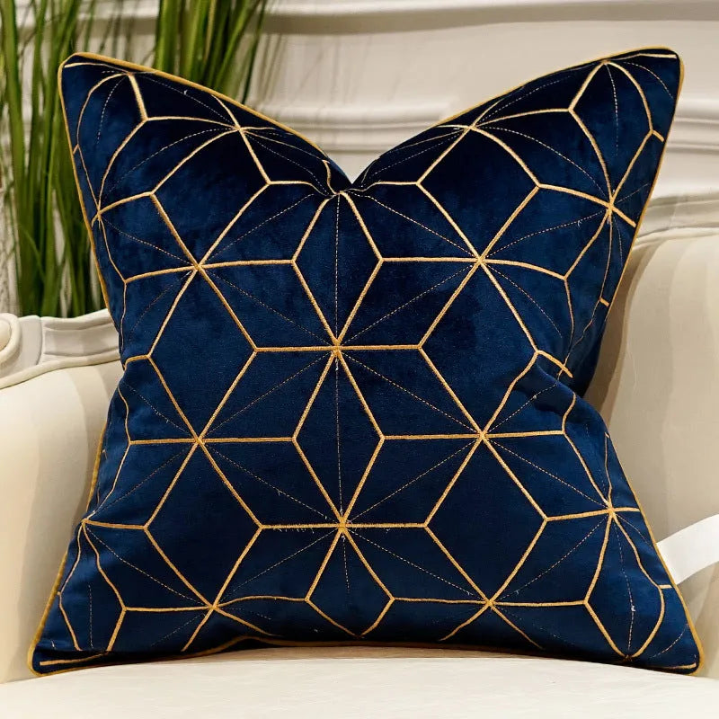 Embroidered plush throw pillow 45x45cm on sofa with soft fabric texture