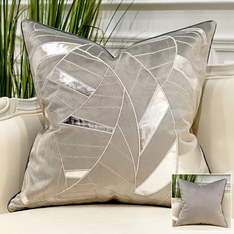 Embroidered plush throw pillow 45x45cm on sofa with soft fabric texture