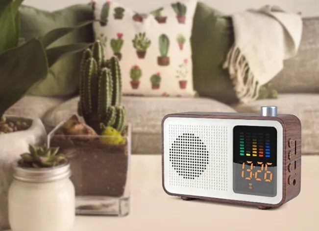 Brown vintage-style portable Bluetooth and FM radio speaker with wooden-effect casing.