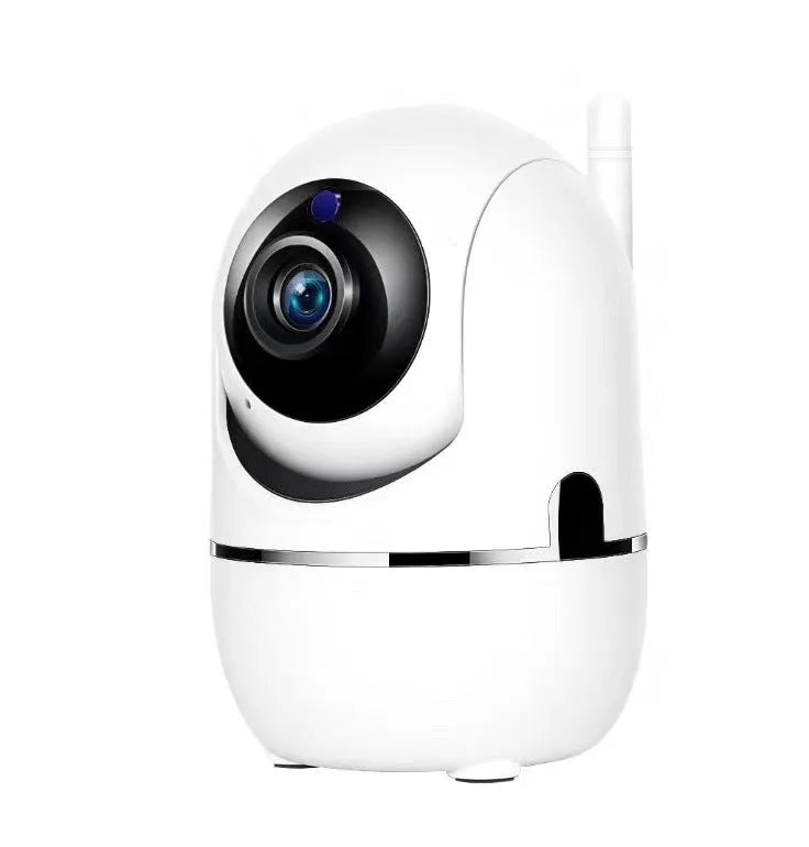 White 1080P WiFi CCTV IP camera with pan tilt lens on desk showing night vision mode