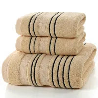 Pure cotton bath towel set with one large towel and two hand towels in neutral colours.