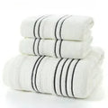 Pure cotton bath towel set with one large towel and two hand towels in neutral colours.